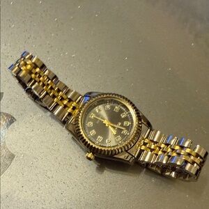 Macy's Elegant Black and Gold Women's Watch